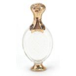 Dutch gold mounted cut glass scent bottle with stopper, impressed marks to the mount, 9.5cm high