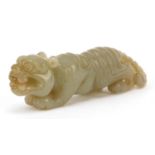 Chinese celadon jade carving of a tiger, 9cm in length