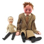 Two vintage ventriloquist dolls including one with straw filled body, the largest 104cm in length