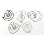 Five silver pendants on necklaces, 23.0g