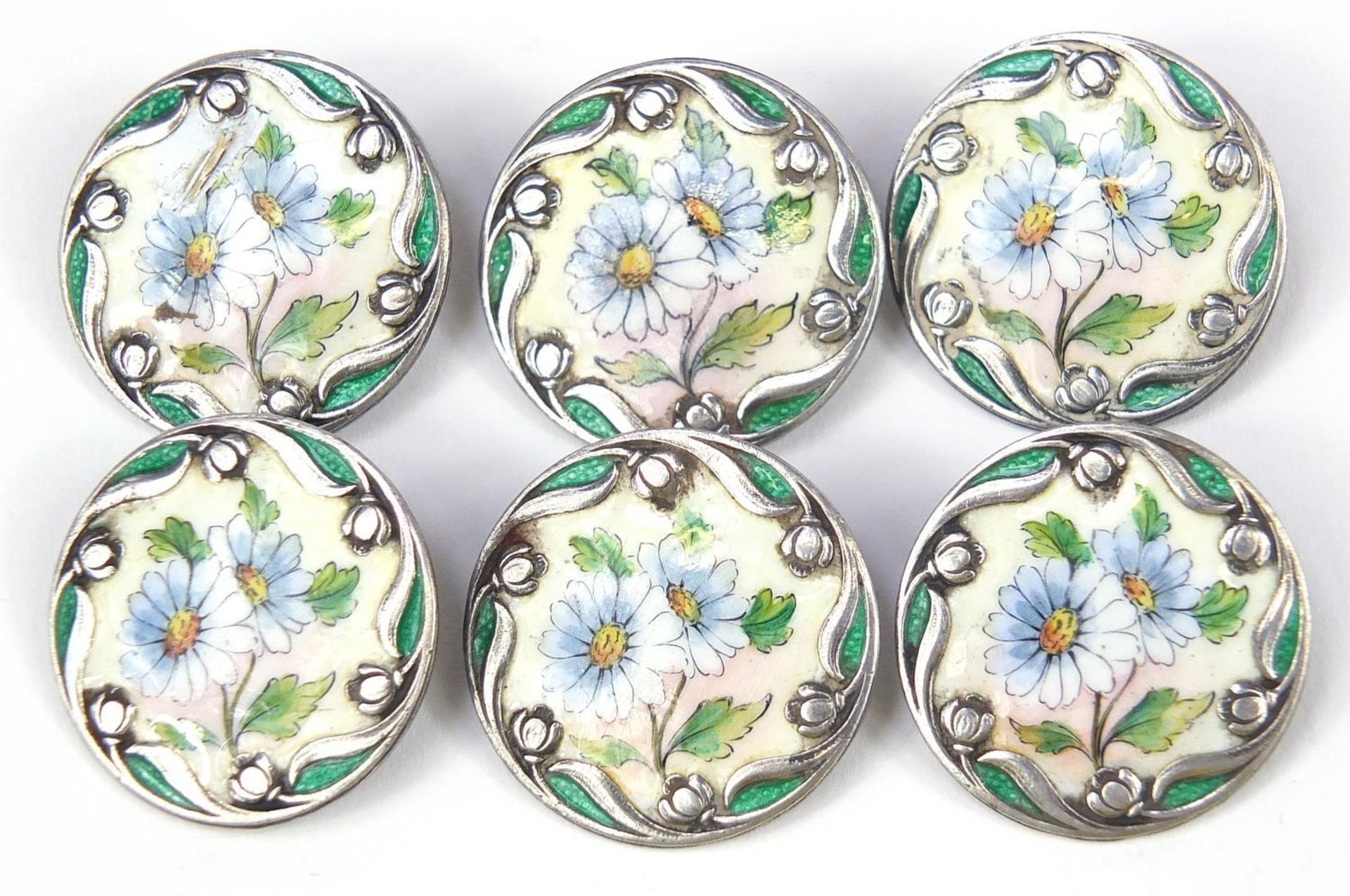 Set of six sterling silver buttons enamelled with flowers, each 2.5cm in diameter, 32.4g