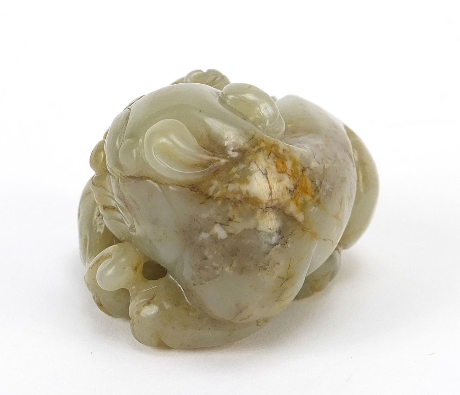 Chinese celadon and russet jade carving of two mythical lions, 6cm wide - Image 2 of 6