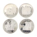 Four commemorative Elizabeth II Isle of Man silver crowns commemorating the life and times of The