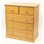 Pine five drawer chest with wooden handles, 110cm H x 100cm W x 58cm D