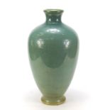 Large Ruskin style vase having a mottled green glaze, 50cm high