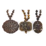 Three Chinese carved hardstone pendant bead necklaces, the largest 44cm in length, total 175.4g