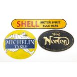 Three cast iron advertising wall plaques including Shell Motor Oil, the largest 50cm wide