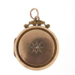 9ct gold back and front locket set with a diamond, 2.8cm high, 5.2g
