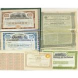 Collection of early 20th century American share certificates arranged in a album