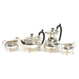 Celtic design silver plated four piece tea service with ebonised handles, the largest 21cm high