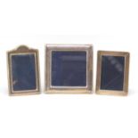 Three modern silver easel photo frames including Carrs, the largest 12cm x 12cm