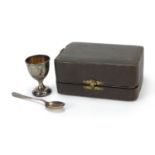 Silver egg cup and matched silver plated spoon housed in a fitted case, the egg cup hallmarked