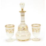 Antique French opaline glass dressing table set gilded with flowers comprising bottle and two