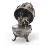 Russian silver egg shaped trinket, decorated with wild animals opening to reveal two deer, impressed