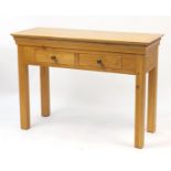 Contemporary light oak hall /side table fitted with two frieze drawers, 82cm H x 115cm W x 45cm D