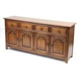 Oak Jacobean design sideboard with four drawers above two pairs of cupboard doors, 85cm H x 180cm