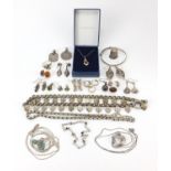 Silver and white metal jewellery including necklaces, christening bangle, amber earrings and