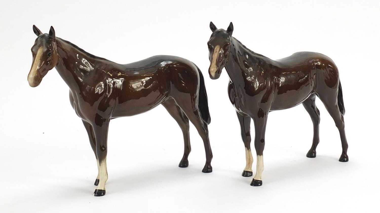 Two Royal Doulton horses, each 25.5cm in length