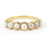 Unmarked 18ct gold graduated pearl ring, size N, 2.9g