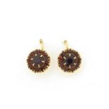 Pair of 9ct gold garnet cluster earrings, 9.5mm in diameter, 1.1g