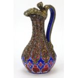 Good Biedermeier Bohemian overlaid glass ewer with Rococo style silver overlay, the silver with