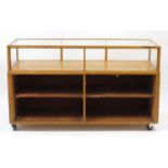 Glazed oak counter display cabinet with G Bainbridge & Son Ltd, Eastbourne label, 88cm H x 153cm W x