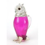 Novelty cranberry glass owl jug with silver plated mounts and beaded glass eyes, 29cm high