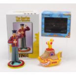 Rock Iconz Beatles Yellow Submarine Ringo figure and a Titan Vinyl Figures Smiley Yellow