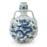 Chinese blue and white porcelain moon flask with twin handles hand painted with a dragon amongst