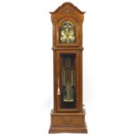 Oak long case clock with moon face dial, 216cm high