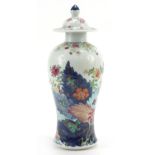Chinese porcelain baluster vase and cover hand painted in the Wucai palette with flowers, 29cm high