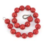 Red hardstone bead necklace, possibly coral, 48cm in length