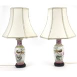 Pair of Chinese porcelain baluster vase table lamps with shades, each 56cm high