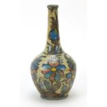 Persian Iznik pottery vase hand painted with flowers, 29cm high