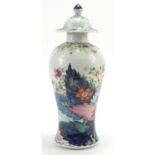 Chinese porcelain baluster vase and cover hand painted in the Wucai palette with flowers, 29cm high