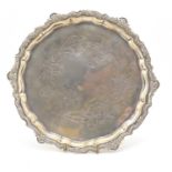 Egyptian silver salver raised on four feet, impressed marks to the base, 22cm in diameter, 323.0g