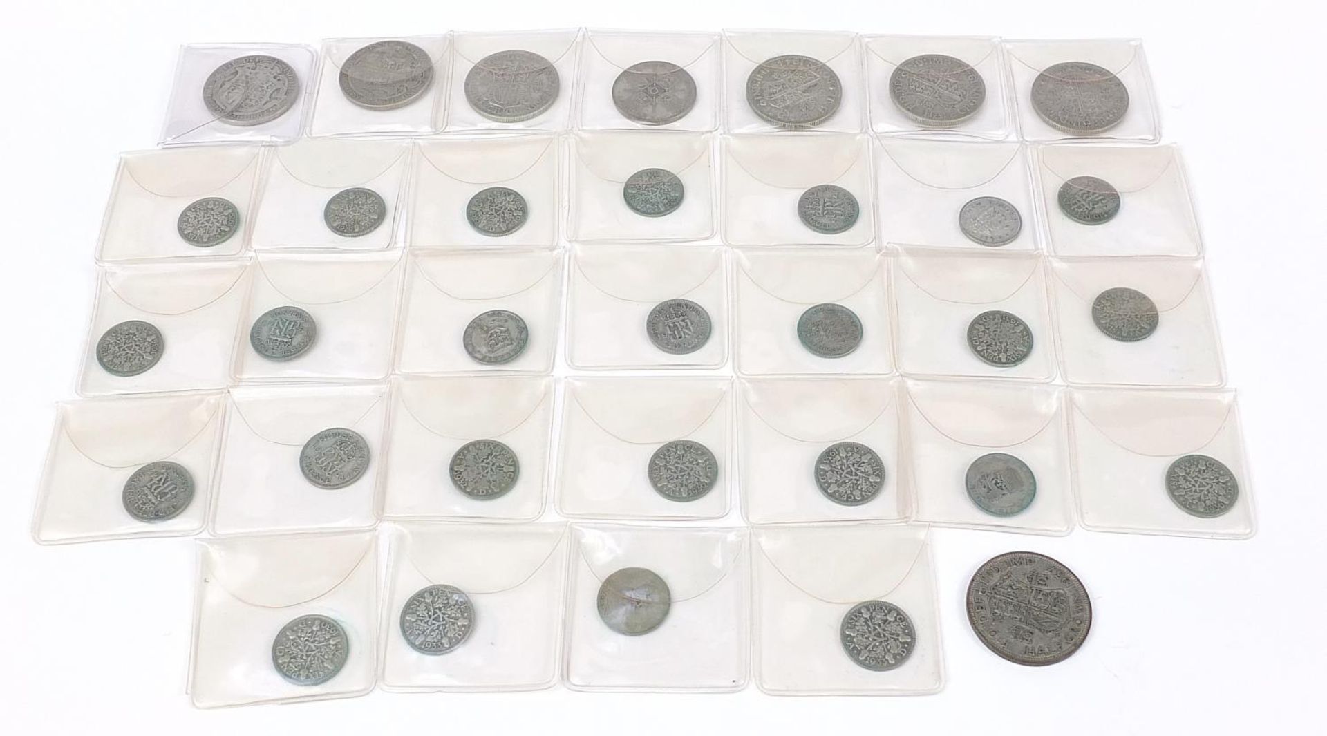 Collection of British pre 1947 half crowns and sixpences, 220g (with plastic sleeves)