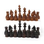 Large carved hardwood chess set, the largest pieces each 12cm high