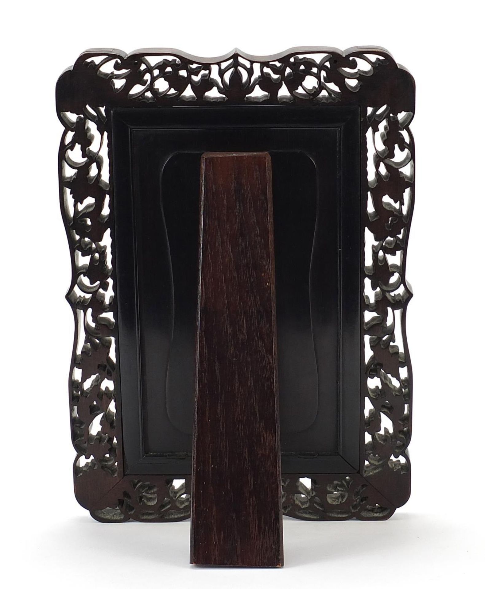 Chinese hardwood easel toilet mirror carved with bats, rats and mythical animals amongst berries and - Image 4 of 6