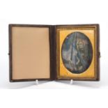 19th century daguerreotype of a mother and child housed in a tooled leather case, 9.5cm x 8.5cm