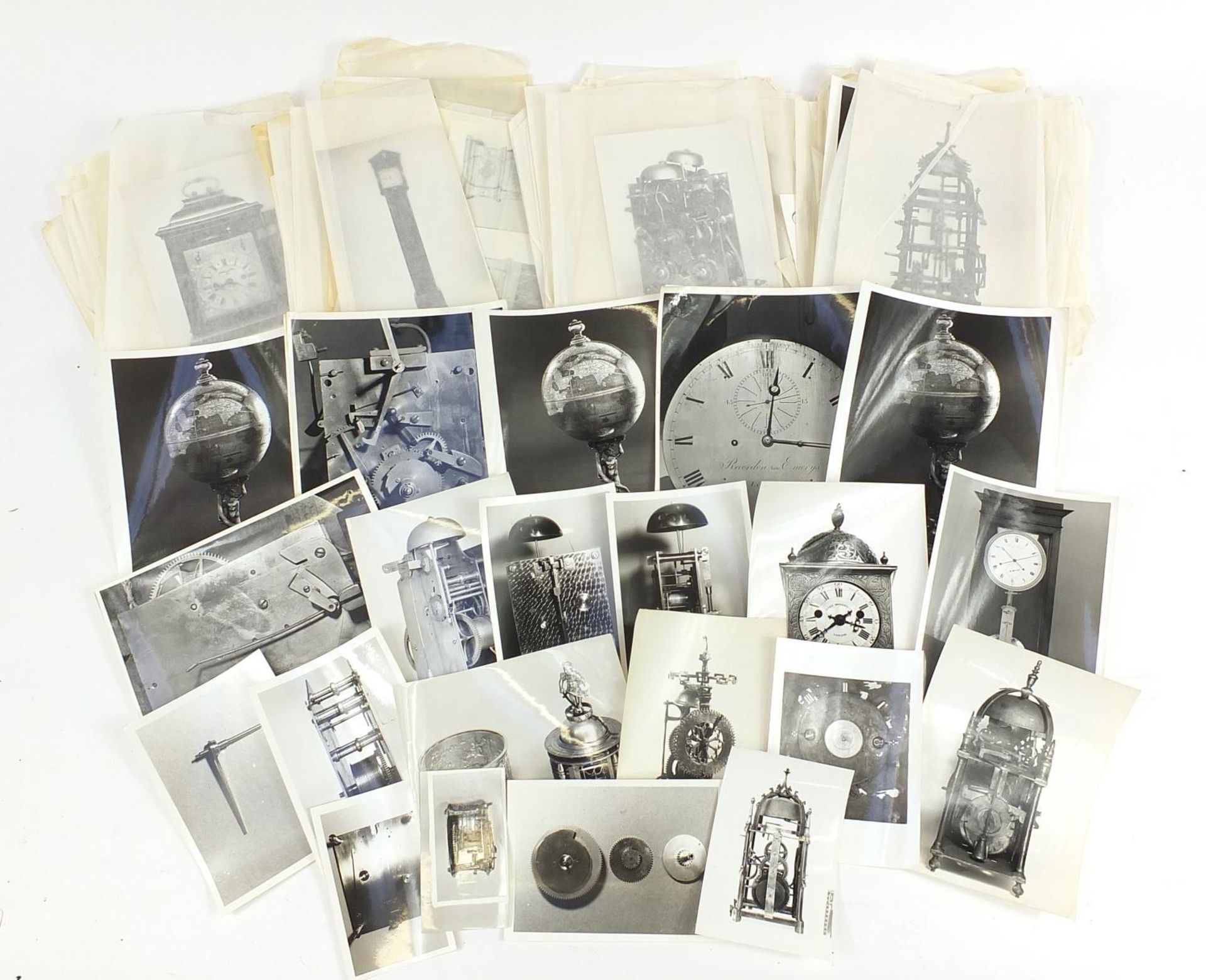 Collection of black and white photographs relating to clocks, some with copyright British Museum