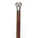 Hardwood walking stick with engraved silver pommel, 92.5cm in length