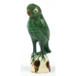 Chinese porcelain bird having a green sancai glaze, 22cm high
