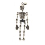 Silver skeleton pendant with articulated limbs, 6.5cm high, 12.5g