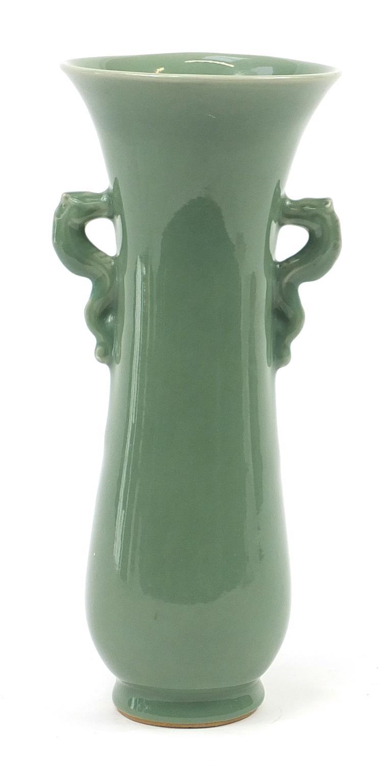 Japanese porcelain vase with dragon handles having a celadon glaze, incised marks to the base,