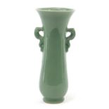 Japanese porcelain vase with dragon handles having a celadon glaze, incised marks to the base,