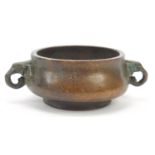 Chinese patinated bronze censer with elephant head handles, four figure character marks to the base,