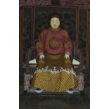 Chinese glass panel reverse painted with an Emperor housed in a hardwood frame, 65cm x 44cm