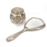 William Comyns & Sons, silver and cut glass jar and cover and a 800 grade silver backed hand mirror,