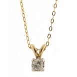 Diamond solitaire pendant on a 9ct gold necklace, the pendant marked 015, the diamond